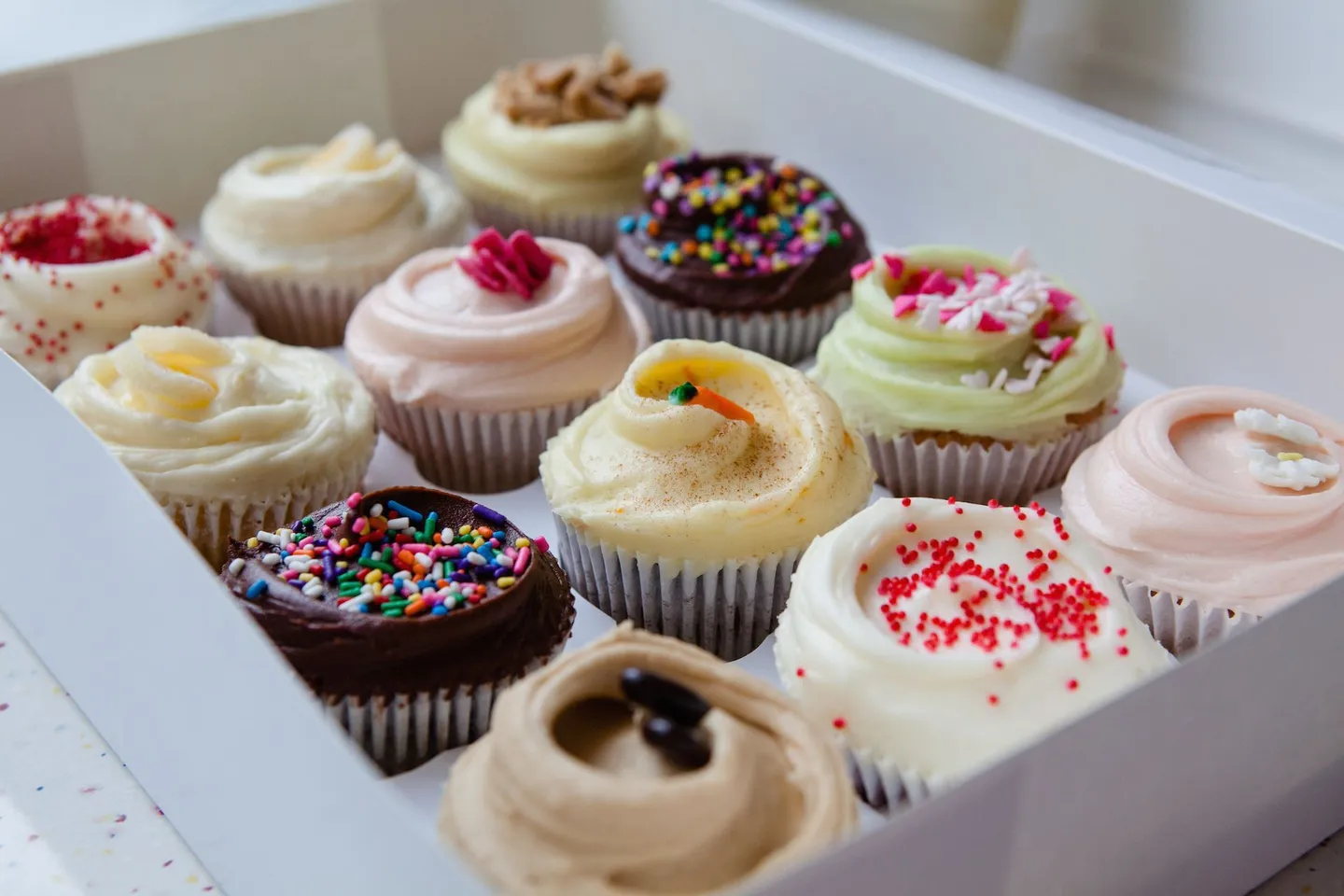 Tray of cupcakes on a table